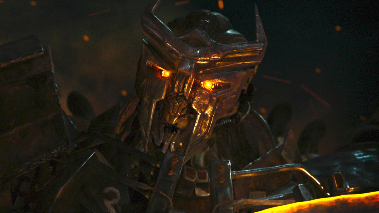  Scourge looks down on the camera in Transformers: Rise of the Beasts. 