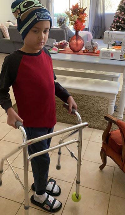 Loxley Greensmith learns to walk again after treatment for leukemia.