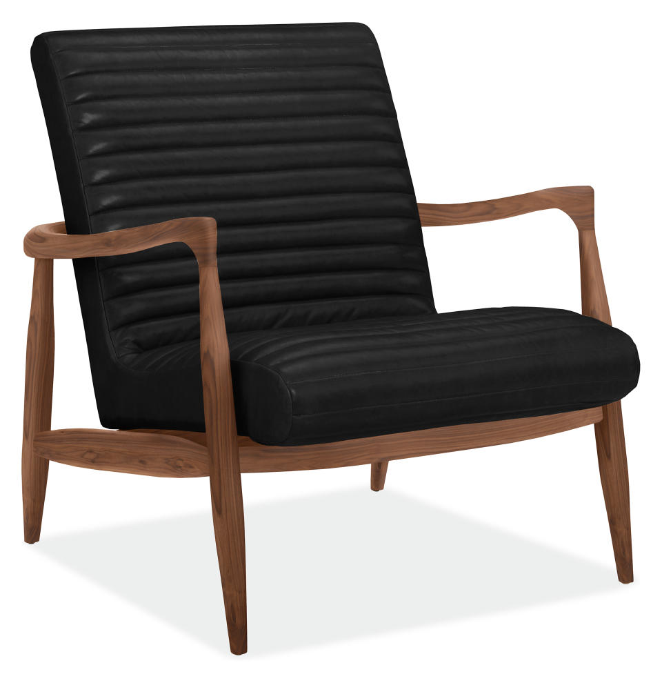 <p><a href="https://www.roomandboard.com/catalog/living/chairs/callan-leather-chair-and-ottoman/977876" rel="nofollow noopener" target="_blank" data-ylk="slk:Shop Now;elm:context_link;itc:0;sec:content-canvas" class="link ">Shop Now</a></p><p>Callan Armchair</p><p>roomandboard.com</p><p>$2399.00</p>