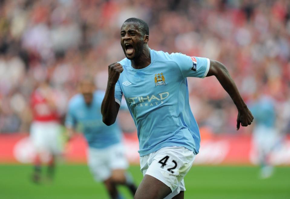 Yaya Toure celebrates scoring against Manchester United in 2011 (The FA via Getty Images)