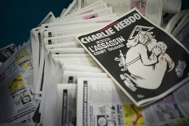 The cover of an edition of French satirical magazine Charlie Hebdo marking the first anniversary of the terror attack on the magazine's offices in Paris in January 2015