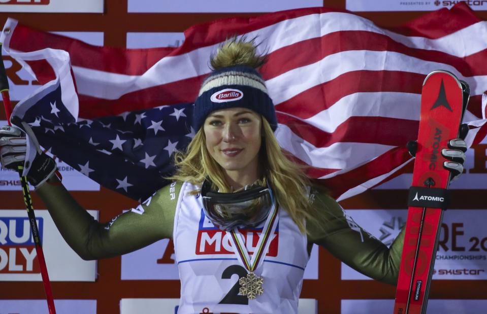 United States' Mikaela Shiffrin celebrates after winning the bronze medal in the women's giant slalom, at the alpine ski World Championships in Are, Sweden, Thursday, Feb. 14, 2019. (AP Photo/Marco Trovati)