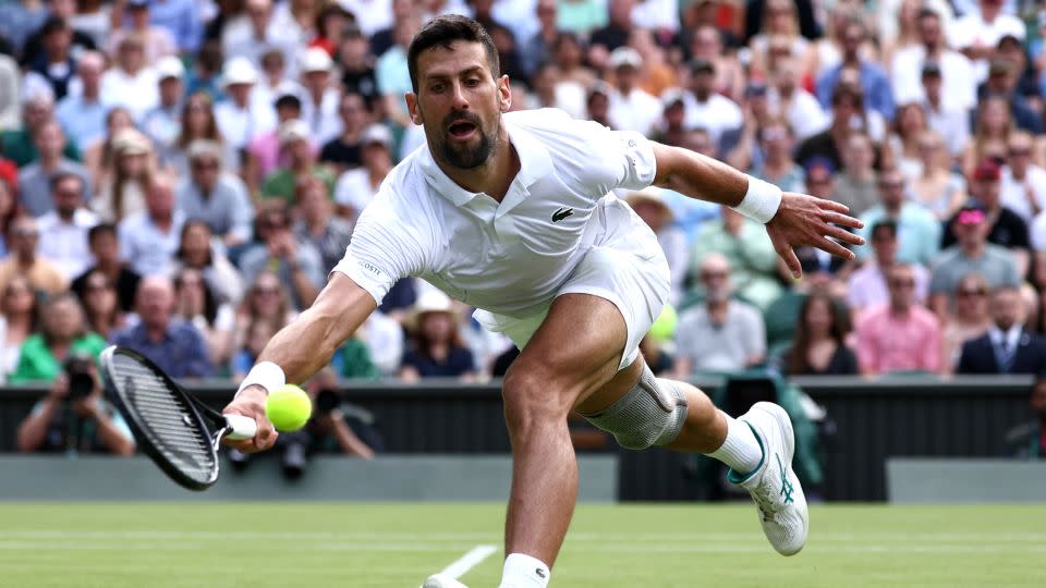 Novak Djokovic of Serbia plays a forehand against Jacob Fearnley of Great Britain in their second-round Wimbledon match on July 4 in London. - Francois Nel/Getty Images