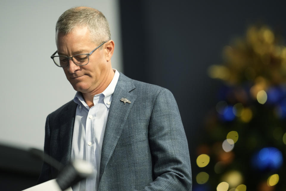 Denver Broncos chief executive officer Greg Penner heads into a news conference about the firing of head coach Nathaniel Hackett Tuesday, Dec. 27, 2022, in Englewood, Colo. (AP Photo/David Zalubowski)