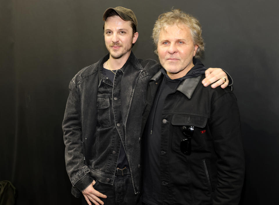 MILAN, ITALY - FEBRUARY 23: Fashion designer Glenn Martens and Renzo Rosso are seen at the Diesel Fashion Show during Milan Fashion Week Womenswear Fall/Winter 2022/23 on February 23, 2022 in Milan, Italy. (Photo by Andreas Rentz/Getty Images for Diesel)