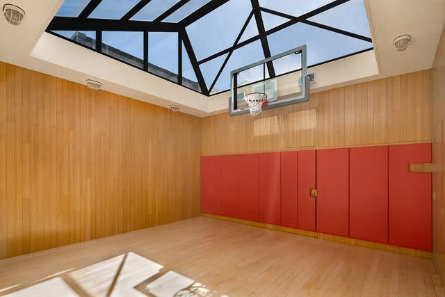 <p>Krisztina Crane/Evan Joseph Photography</p> Basketball court.