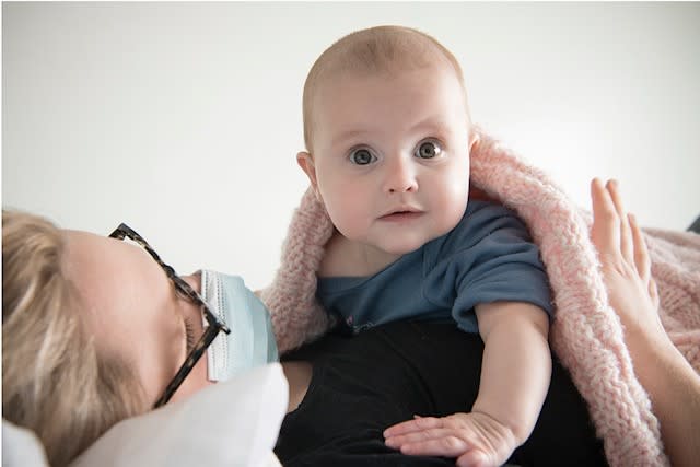 Madelyn (pictured recently with her mother Lauren Grant) developed multi-system inflammatory syndrome after catching the coronavirus. (Supplied: Cleveland Clinic)