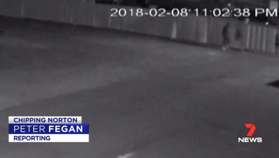 A man is captured on security cameras almost tip-toeing into the yard. Source: 7 News