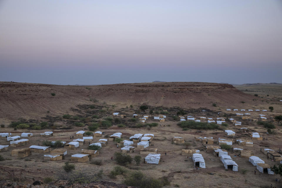 A general view of Umm Rakouba refugee camp which is currently hosting Tigray people who fled the conflict in Ethiopia's Tigray region, in Qadarif, eastern Sudan, Thursday, Nov. 26, 2020. Ethiopia's prime minister said Thursday the army has been ordered to move on the embattled Tigray regional capital after his 72-hour ultimatum ended for Tigray leaders to surrender, and he warned the city's half-million residents to stay indoors and disarm. (AP Photo/Nariman El-Mofty)