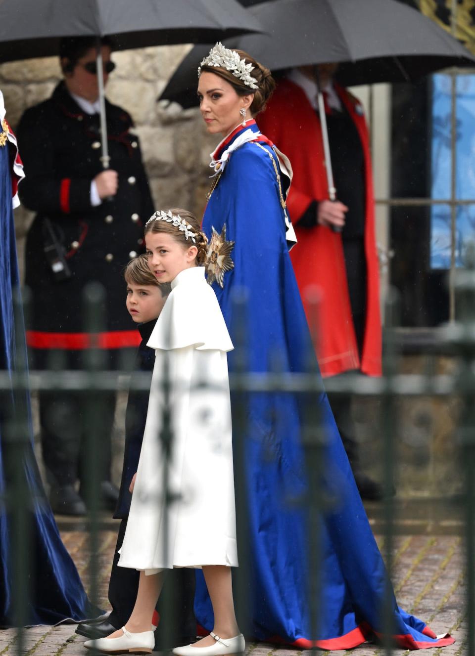 Catherine, Princess of Wales, Prince Louis, and Princess Charlotte arrive at Westminster Abbey for the Coronation of King Charles III and Queen Camilla on May 06, 2023 in London, England.