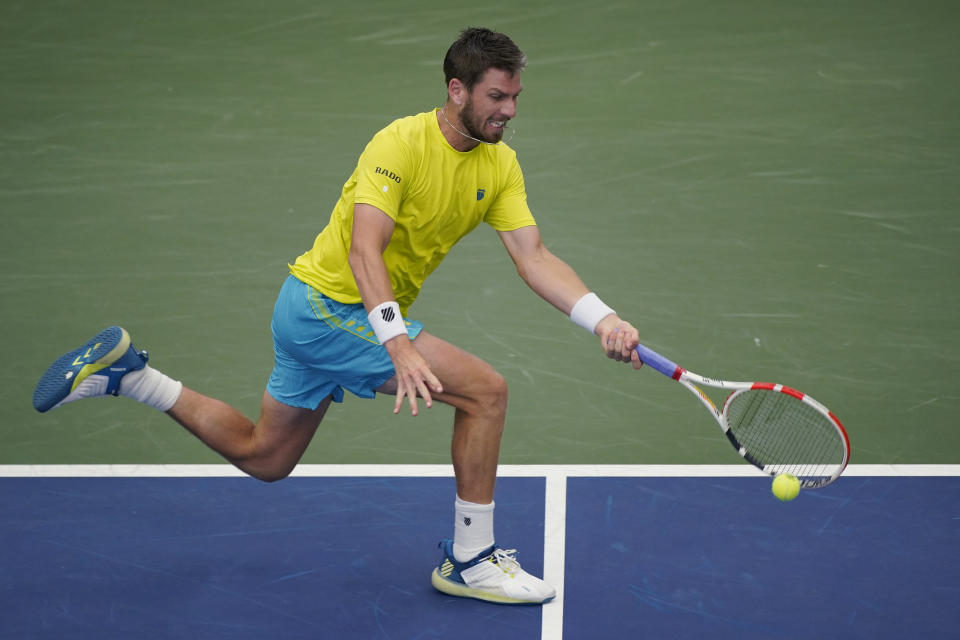 Cameron Norrie, of Great Britain, returns to Andrey Rublev, of Russia, during the fourth round of the U.S. Open tennis championships, Monday, Sept. 5, 2022, in New York. (AP Photo/Eduardo Munoz Alvarez)