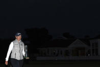 South Africa's Ashleigh Buhai poses for the media holding the trophy after winning the Women's British Open golf championship, during the presentation ceremony in Muirfield, Scotland, Sunday, Aug. 7, 2022. (AP Photo/Scott Heppell)