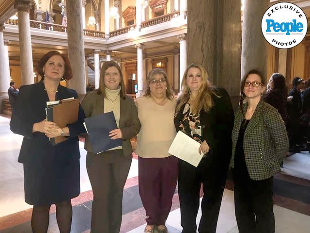 <p>Courtesy Genevieve Meyer</p> Meyer (second from right) at Indiana’s Statehouse in 2020 after the legal age for marriage was—in most cases—raised to 18.