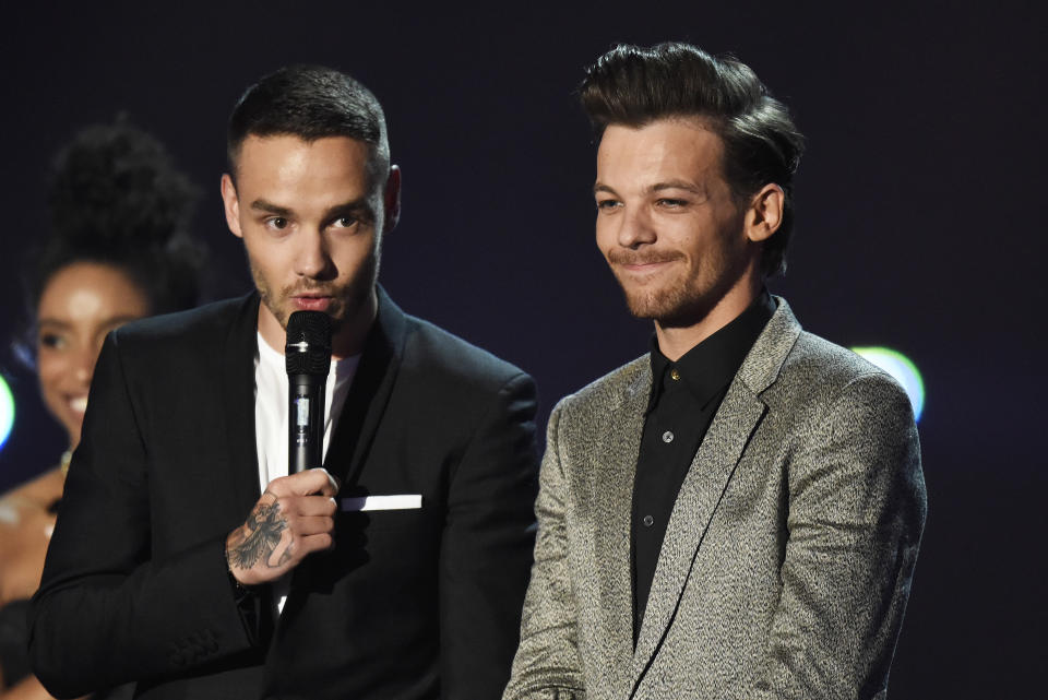 LONDON, ENGLAND - FEBRUARY 24: (EDITORIAL USE ONLY)  Liam Payne and Louis Tomlinson from One Direction accept the award for British Artist Video at the BRIT Awards 2016 at The O2 Arena on February 24, 2016 in London, England.  (Photo by Dave J Hogan/Dave J Hogan/Getty Images)