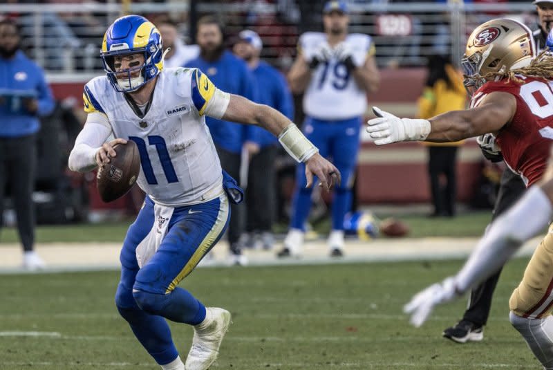 Quarterback Carson Wentz (L) served as a backup last season for Los Angeles Rams starter Matthew Stafford. File Photo by Terry Schmitt/UPI