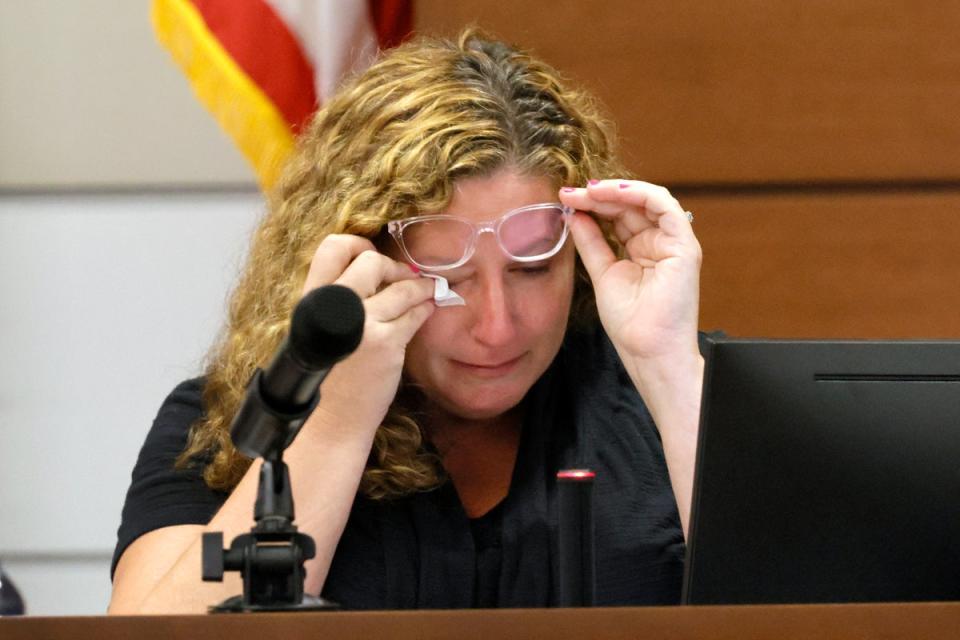 Marjory Stoneman Douglas High School teacher Dara Hass wipes away tears as she testifies (Getty Images)