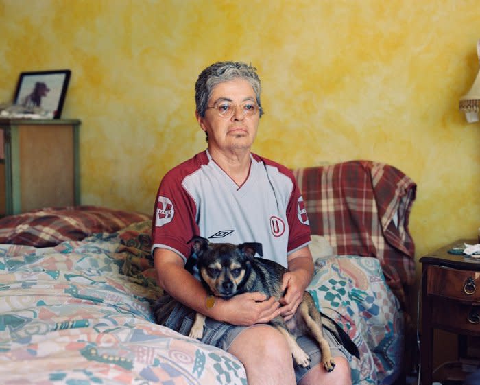 Mama Lu in her bedroom with our dog, Pukyu (Quechua for spring), photographed in 2019.<span class="copyright">Quetzal Maucci</span>