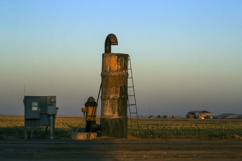 Danuba, CA - October 12: A ground water pump for irrigation at sunrise on Tuesday, Oct. 12, 2021 in Danuba, CA. (Irfan Khan / Los Angeles Times)