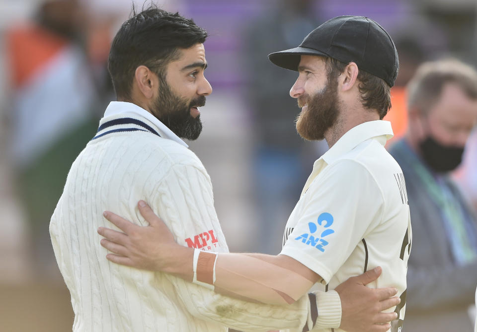 Virat Kohli (pictured left) interacts with Kane Williamson (pictured right) after  Day 6 of the ICC World Test Championship Final between India and New Zealand at The Hampshire Bowl on June 23, 2021 in Southampton, England.