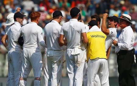 Cricket - India v England - Fourth Test cricket match - Wankhede Stadium, Mumbai, India - 10/12/16. England's Alastair Cook (2nd R) celebrates with teammates the wicket of India's Karun Nair. REUTERS/Danish Siddiqui