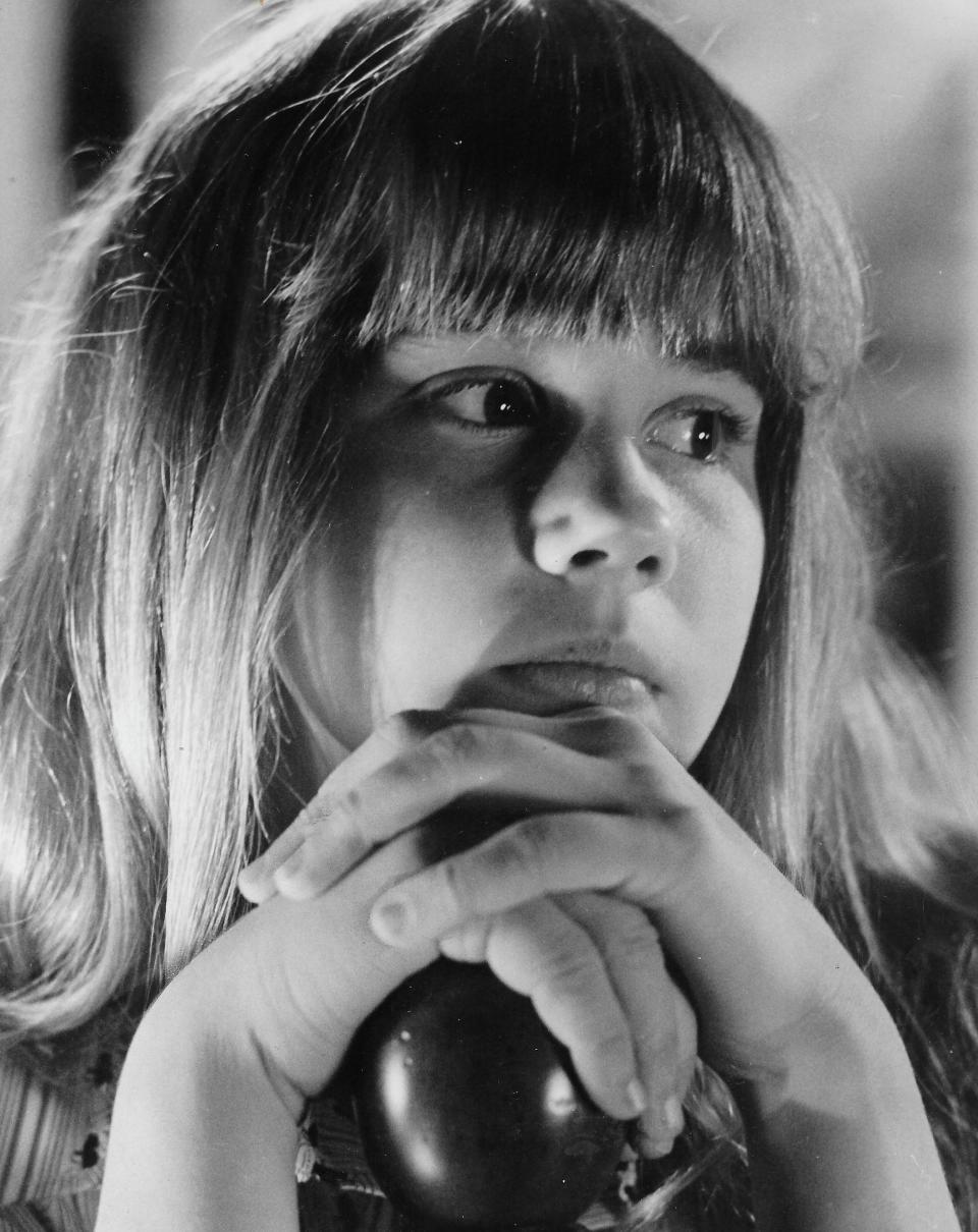 Linda Blair plays Regan, a girl possessed by a demon, in the horror movie “The Exorcist.”