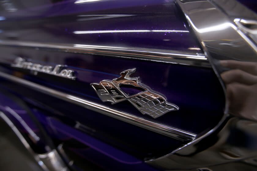 LONG BEACH, CALIF. - FEB. 1, 2023. The badge of a customized Chevrolet Impala at the shop of metal plating specilist Luis "Speedy" Rodriguez in Long Beach. (Luis Sinco / Los Angeles Times)
