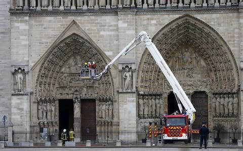 Forensic investigators face a 49-hour wait to work inside the Notre-Dame - Credit: Ian Langsdon/REX