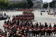 <p>The Cavalry Regiment of the French Republican Guard parades during the traditional Bastille Day military parade on the Champs-Elysees avenue in Paris, France, July 14, 2017. (Photo: Charles Platiau/Reuters) </p>