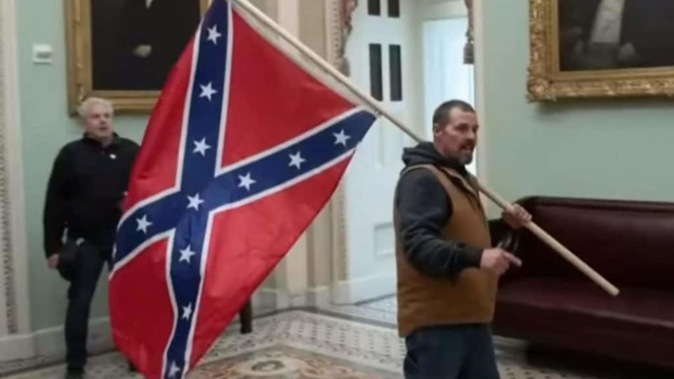 The U.S. Attorney’s Office identified this man, Kevin Seefried of Delaware, who joined the lengthening roster of arrested insurrectionists from the Jan. 6 siege at the U.S. Capitol, along with his son. (CBS News/YouTube)