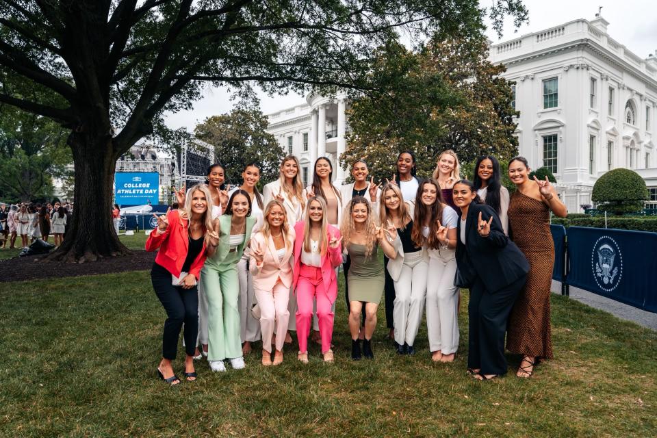 The national champion Texas volleyball team poses in front of the White House during the College Athlete Day celebration Monday.