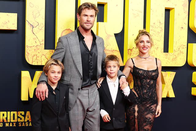 <p>Don Arnold/WireImage</p> Elsa Pataky and Chris Hemsworth pose alongside their children Tristan and Sasha