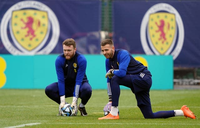 Zander Clark and Angus Gunn (right) are among the trio battling for the gloves