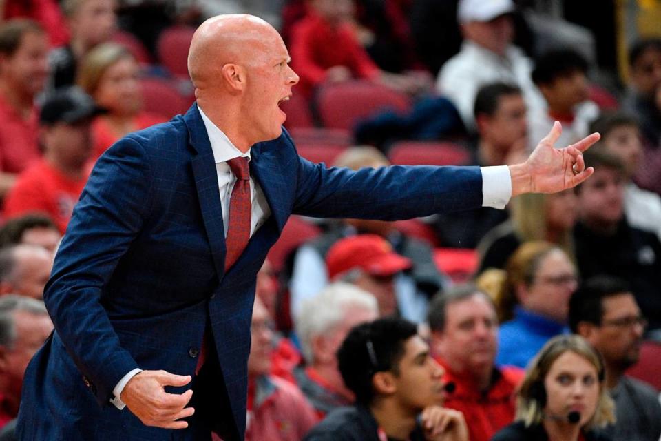 Dec 14, 2019; Louisville, KY, USA; Eastern Kentucky Colonels head coach A.W. Hamilton calls out from the sidelines during the first half against the Louisville Cardinals at KFC Yum! Center. Mandatory Credit: Jamie Rhodes-USA TODAY Sports
