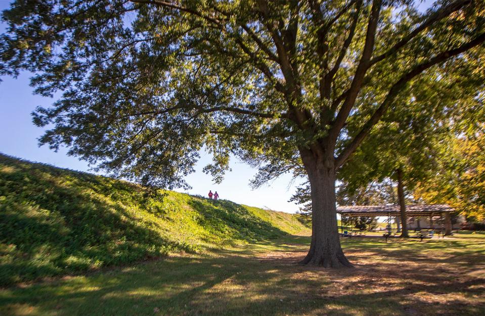 People accessing  walk path along the Delaware River levee in Williamson Park in Morrisville, on Tuesday, Oct. 19, 2021.