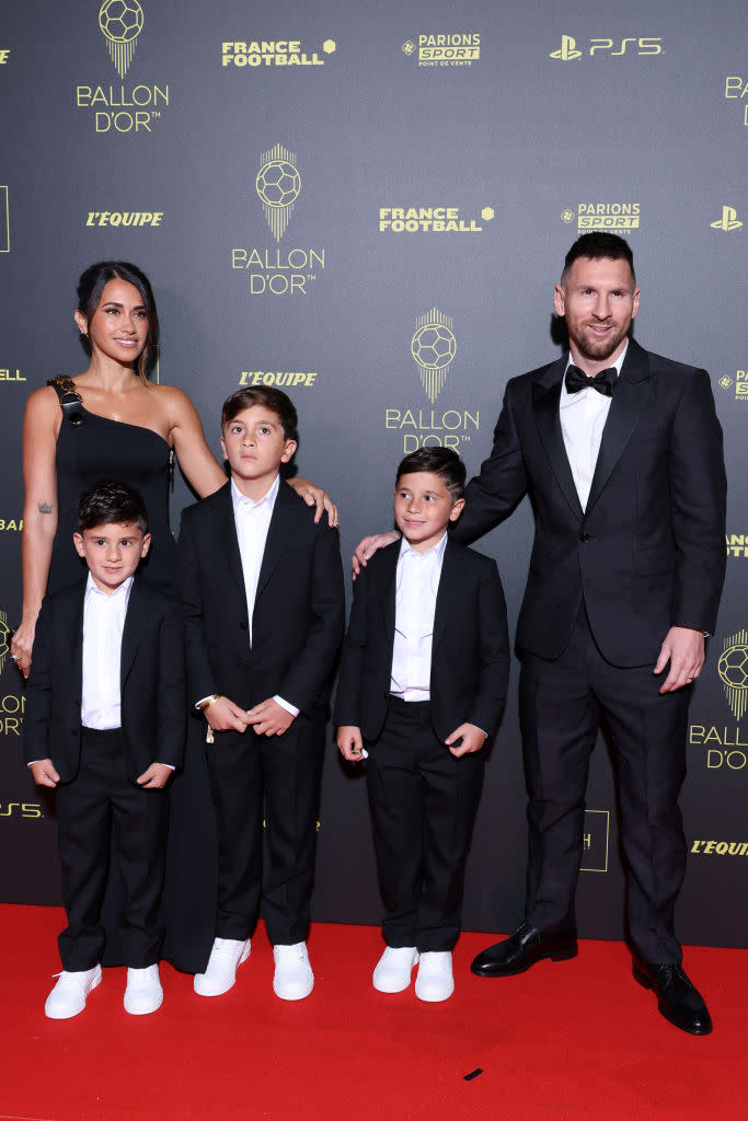 Antonela Roccuzzo and Lionel Messi with sons Thiago Messi, Mateo Messi Roccuzzo and Ciro Messi Roccuzz on Oct. 30 at the 2023 Ballon D'Or Photocall in Paris.