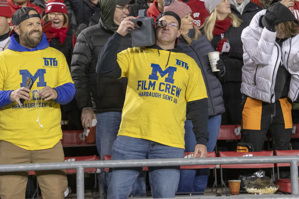 MADISON, WI - OCTOBER 28: A fan dresses up as the Michigan Film Crew for halloween durning a college football game between the Ohio State Buckeyes and the Wisconsin Badgers on October 28th, 2023 at Barry Alvarez field at Camp Randall Stadium in Madison, WI. (Photo by Dan Sanger/Icon Sportswire via Getty Images)