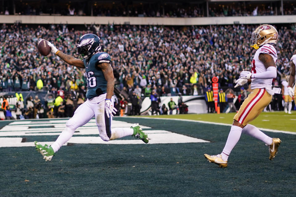 Philadelphia Eagles running back Miles Sanders, left, celebrates after scoring during the first half of the NFC Championship NFL football game between the Philadelphia Eagles and the San Francisco 49ers on Sunday, Jan. 29, 2023, in Philadelphia. (AP Photo/Matt Rourke)