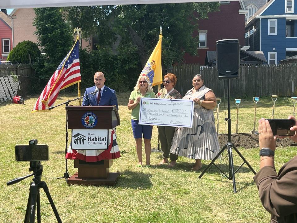 Perth Amboy Mayor Helmin Caba speaks at the Morris Habitat for Humanity groundbreaking.