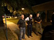 Florence County Sheriff Kenney Boone, from left, Florence Police Chief Allen Heidler and Florence County Chief Deputy Glenn Kirby speak to the media following a shooting where several law enforcement officers were shot, one fatally, Wednesday, Oct. 3, 2018, in Florence, S.C. (AP Photo/Jeffrey Collins)