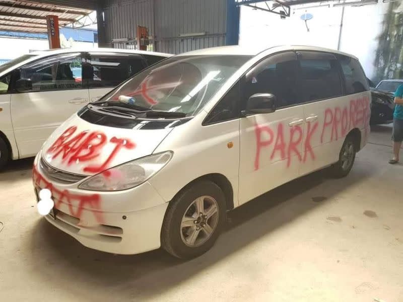 A car in Kuala Lumpur was spray painted in red over alleged bad parking. ― Picture via Facebook/mcclubz
