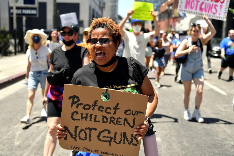 Protesters participate in March For Our Lives II to protest against gun violence on June 11, 2022, in Los Angeles. (Photo by Sarah Morris/Getty Images)