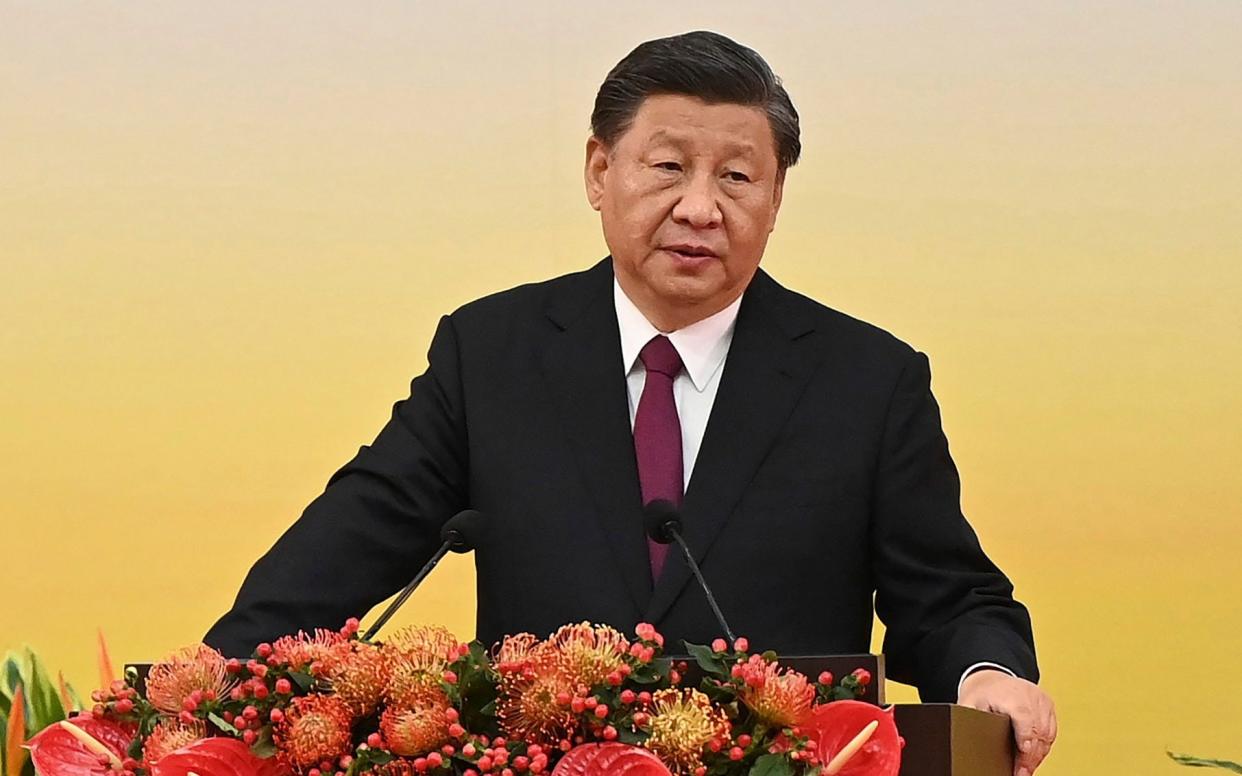 Xi Jinping, the president of China, gives a speech following a swearing-in ceremony to inaugurate Hong Kong's new government on July 1, 2022 - Selim Chtayti/AFP