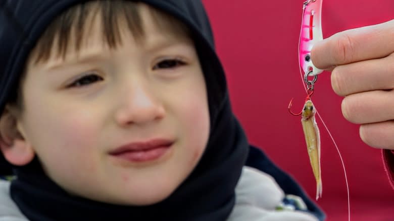 'It's a spiritual thing': Ice fishing drawing families, young people, Manitoba enthusiasts say