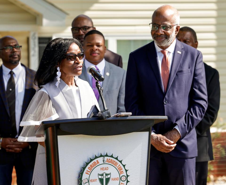 FAMU President Larry Robinson, right, listens as Karen Epps, Director of the Federal Higher Education Emergency Response Unit speaks on Wednesday April 26, 2023. Members of the U.S. Department of Education visit FAMU’s recently purchased Rattler Pointe housing. The units were purchased with HEERF funds.