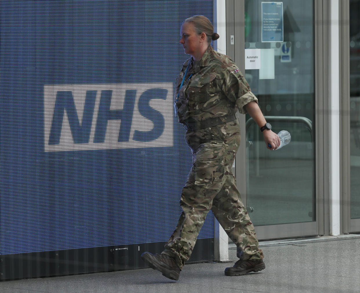 A member of the military at the ExCel centre in London which is being made into a temporary hospital - the NHS Nightingale hospital, comprising of two wards, each of 2,000 people, to help tackle coronavirus. (Photo by Yui Mok/PA Images via Getty Images)