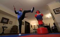 Egyptian Taekwondo practitioner and 2016 Rio Olympics bronze medallist Wahba works out at her home amidst the spread of the coronavirus disease (COVID-19) in Cairo