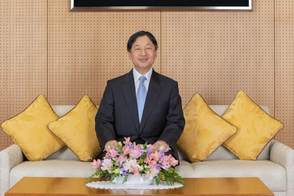 In this Feb. 12, 2020, photo released by Imperial Household Agency of Japan, Japan's Emperor Naruhito poses his residence in Tokyo ahead of his 60th birthday on Sunday, Feb. 23, 2020. Naruhito offered his sympathy to those affected by the new virus that emerged in China and said he hopes to see the outbreak contained soon. Birthday celebration plans had called for him to wave from the palace balcony to tens of thousands of well-wishers, but they were canceled as a precautionary anti-infection measure. (Imperial Household Agency of Japan via AP)