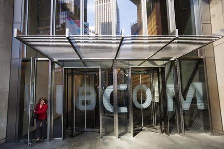 A woman exits the Viacom Inc. headquarters in New York April 30, 2013. REUTERS/Lucas Jackson