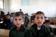 Twin brothers attend a class at the school of The al-Shawkani Foundation for Orphans Care in Sanaa, Yemen, December 25, 2016. REUTERS/Khaled Abdullah