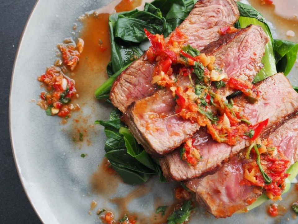 Sirloin steak with Asian greens and nam jim dressing. Photo: Scott Gooding Nourished ebook